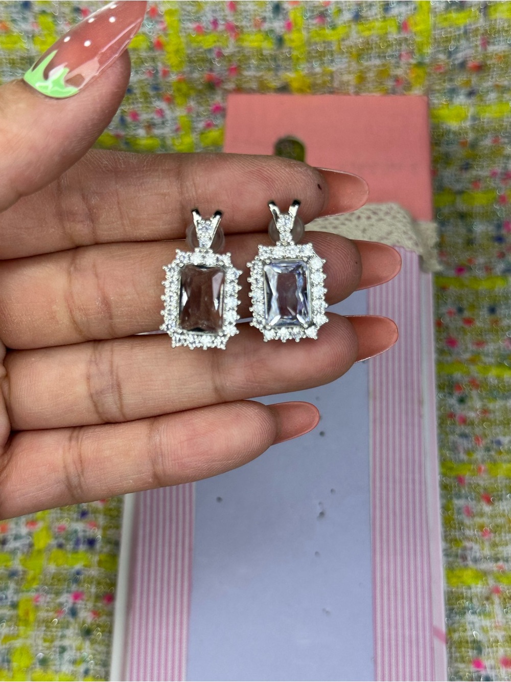 A great Silver Halo Emerald-Cut Pink Crystal erring